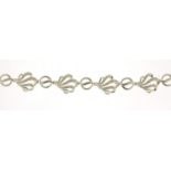9ct white gold diamond shell design bracelet, 18cm in length, 8.5g :For Further Condition Reports