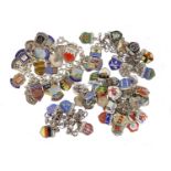 Silver charm bracelet with a large selection of silver and enamel shield charms, 101.5g :For Further
