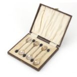 Set of six silver coffee bean spoons by Adie Bros, with fitted tooled leather case, Birmingham 1930,