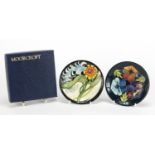 Two Moorcroft pottery dishes one with box, both hand painted with stylised flowers, dated 2005 and