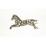 Antique unmarked gold diamond horse brooch with ruby eye, 3cm in length, 3.2g :For Further Condition