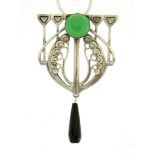 Art Nouveau style silver coloured metal and enamel pendant with green and black stones, on a