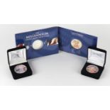 Three United States coloured silver dollars, two with cases comprising dates 2000, 2003 and 2005 :