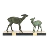 Art Deco bronzed sculpture of two deer raised on a marble base, 55.5cm wide :For Further Condition