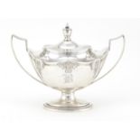 Sterling silver twin handled sugar bowl and cover, Birmingham hallmarked, 13.5cm H x 20.5cm W, 379.