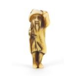 Japanese carved ivory netsuke of a fisherman, 55cm high :For Further Condition Reports Please