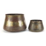 Two Islamic Cairo Ware brass pots engraved with calligraphy amongst foliage, the largest 19cm