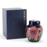 Moorcroft pottery ginger jar and cover with box, hand painted in the Hibiscus pattern, 16cm high :