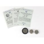 Three United States of America silver coins with certificates comprising 1907 Colonial dollar,