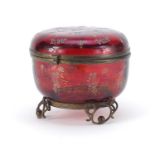 Continental ruby glass bomboniere with metal mounts, enamelled with flowers, 11.5cm high :For