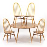 Ercol light elm drop leaf dining table and four stick back chairs, the table 71cm H x 65cm W (