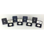 Four American eagle silver proof one ounce bullion coins, with cases and boxes comprising dates