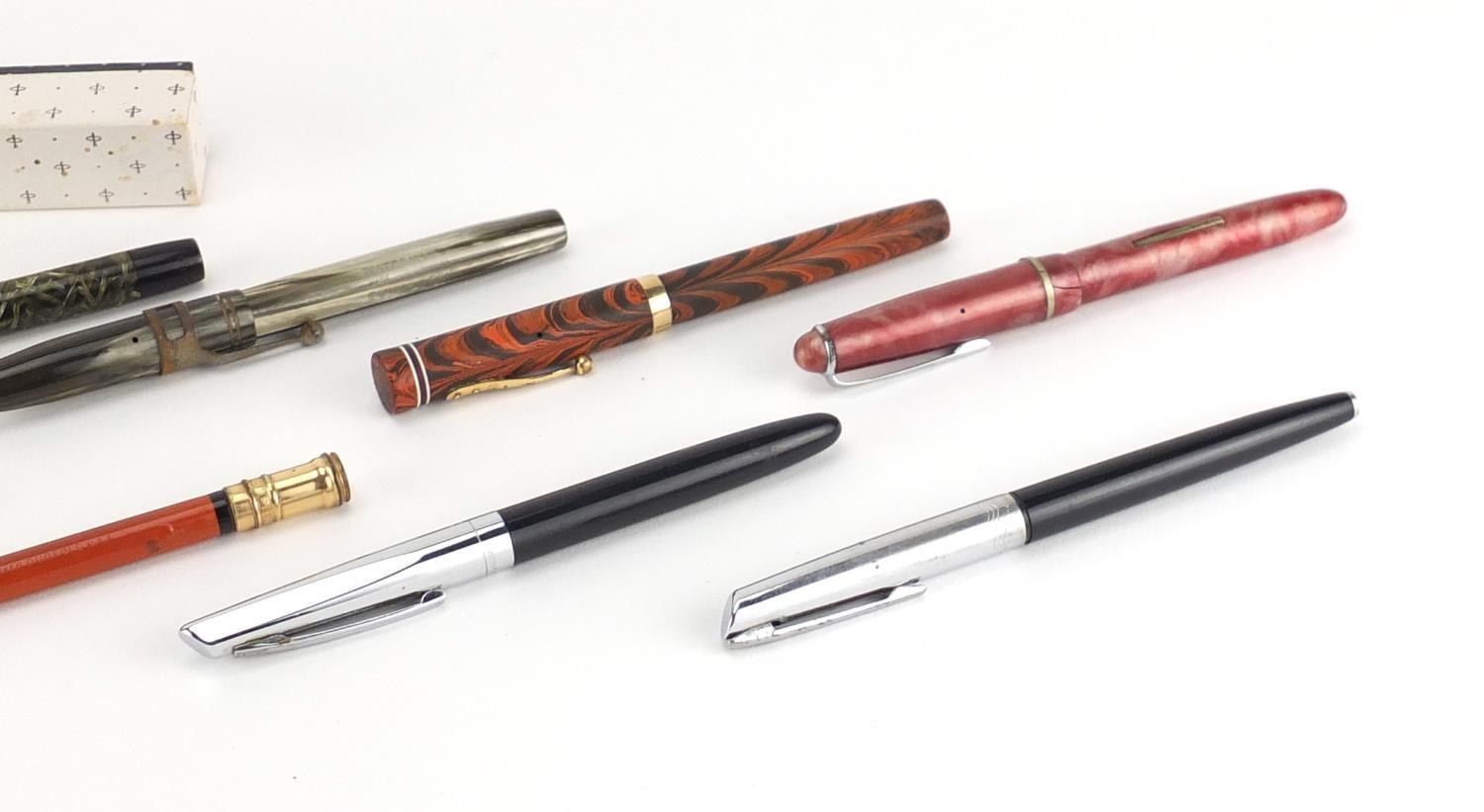 Fountain pens and propelling pencils including a Waterman's brown ripple with 9ct gold band, - Image 5 of 13