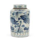 Chinese blue and white porcelain cylindrical jar and cover, hand painted with fish amongst reeds and