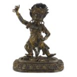 Large Chino-Tibetan gilt patinated bronze dancing deity, 50cm high :For Further Condition Reports