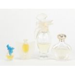 Four Lalique scent bottles including L'Air Du Temps, the largest 14cm high :For Further Condition