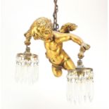 Gilt plaster cherub design hanging light fitting, with cut glass drops, 33cm high :For Further