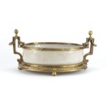 Four footed crackle glazed centre piece with twin handles, having ornate brass mounts, 42cm wide :