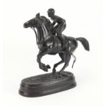 Patinated bronze model of a jockey on horseback, 30cm high :For Further Condition Reports Please