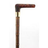 Bamboo walking stick with simulated tortoiseshell handle and 18ct gold collar by Brigg, 88cm in