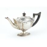 Victorian silver teapot with fluted body and ebonised handle and knop, indistinct maker mark