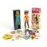 Two 1960's dolls with accessories and boxes comprising Sindy in Weekenders with original clothes and