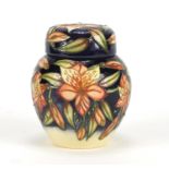 Moorcroft ginger jar and cover hand painted in the Peruvian Lily pattern dated 2003, 11cm high :