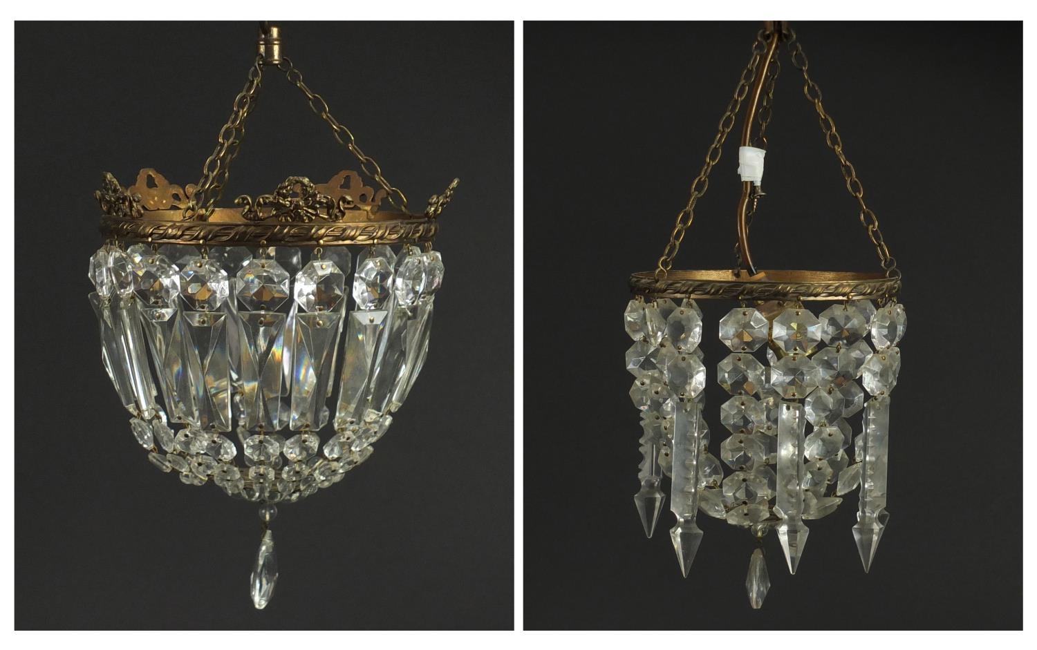 Two brass bag chandeliers with cut glass drops, the largest 20cm high x 16cm in diameter :For