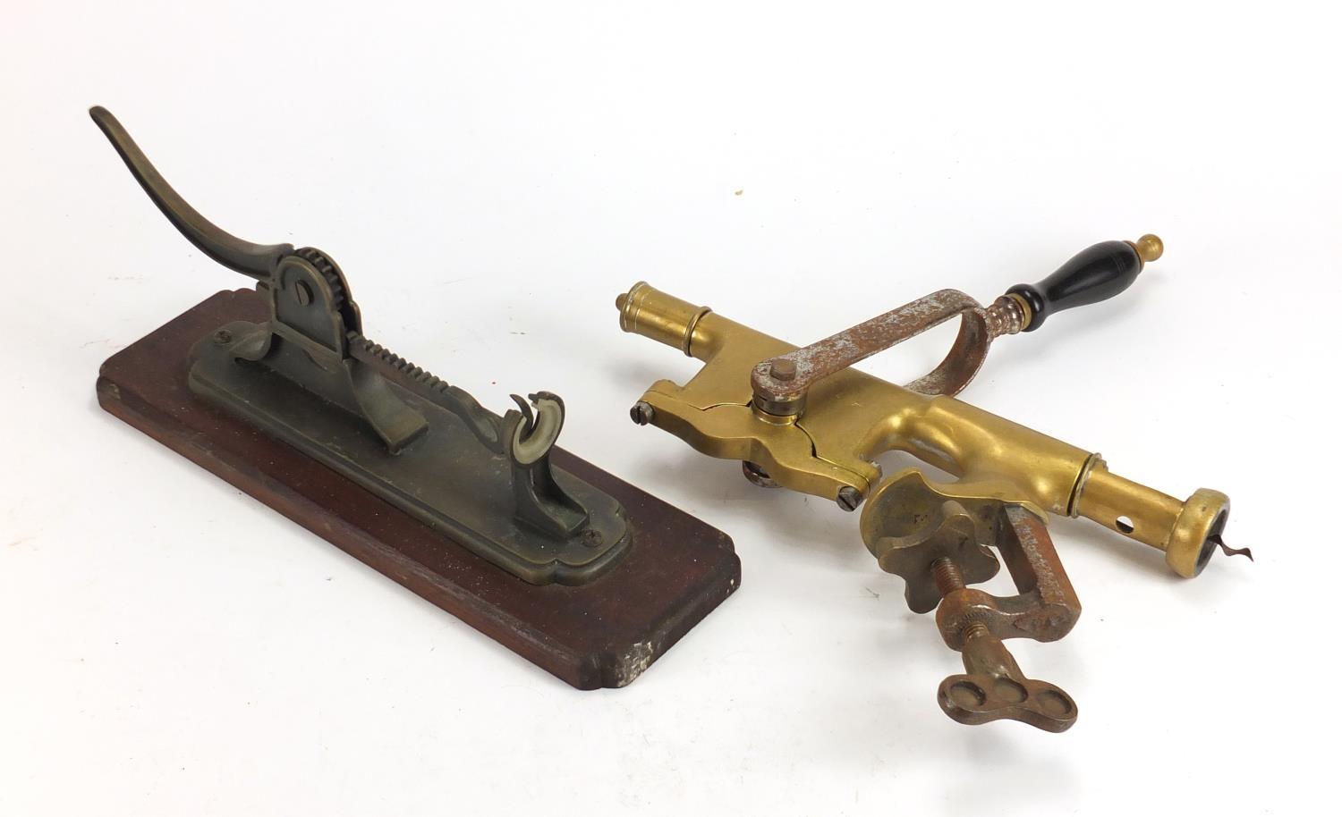 Two vintage bar corkscrews, the largest 51cm in length : For Further Condition Reports Please