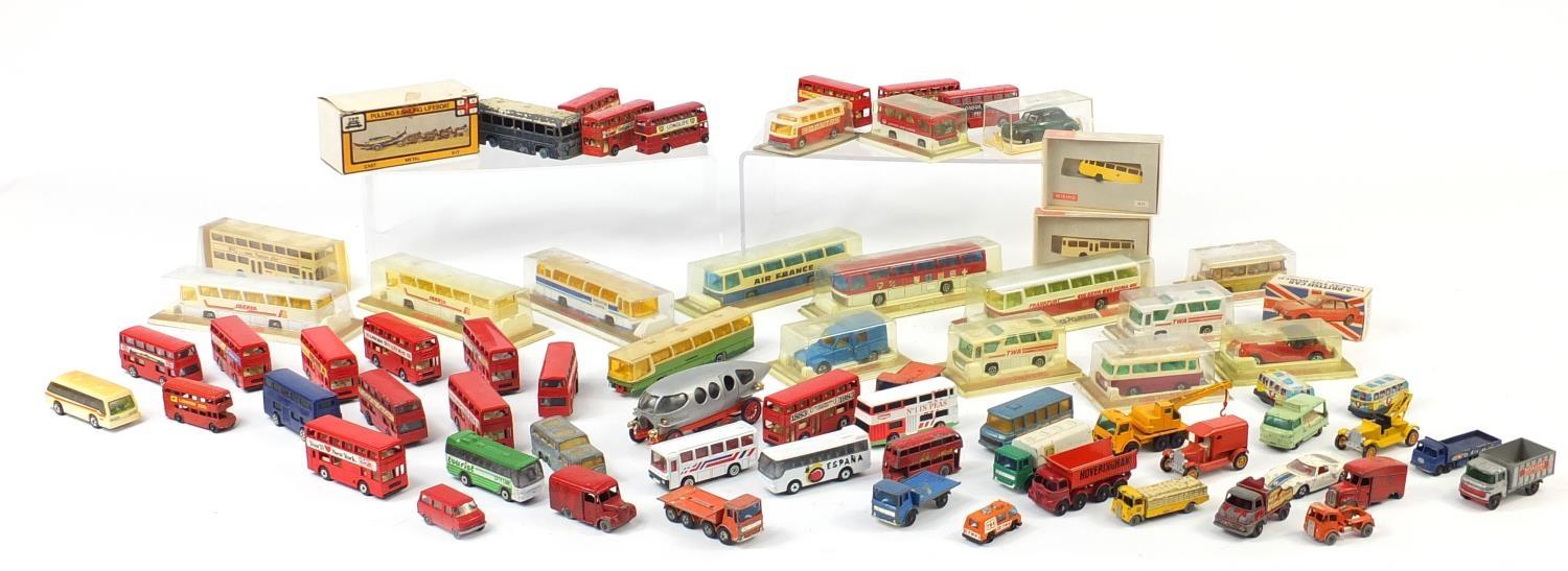 Mostly die cast vehicles including Majorette coaches, Matchbox Series and a D & M pulling and