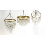 Three circular brass chandeliers with cut glass drops, the largest 40cm high x 25cm in diameter :