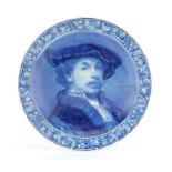 Delft pottery charger decorated with a portrait of Rembrandt, painted marks to the reverse, 40.5cm