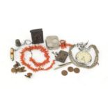 Objects including a silver vesta, silver moon stone scorpion brooch, vulcanite vesta and a coral