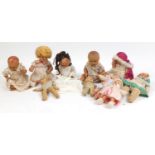 Ten vintage composite dolls some with jointed limbs and open/close eyes, the largest 50cm high : For