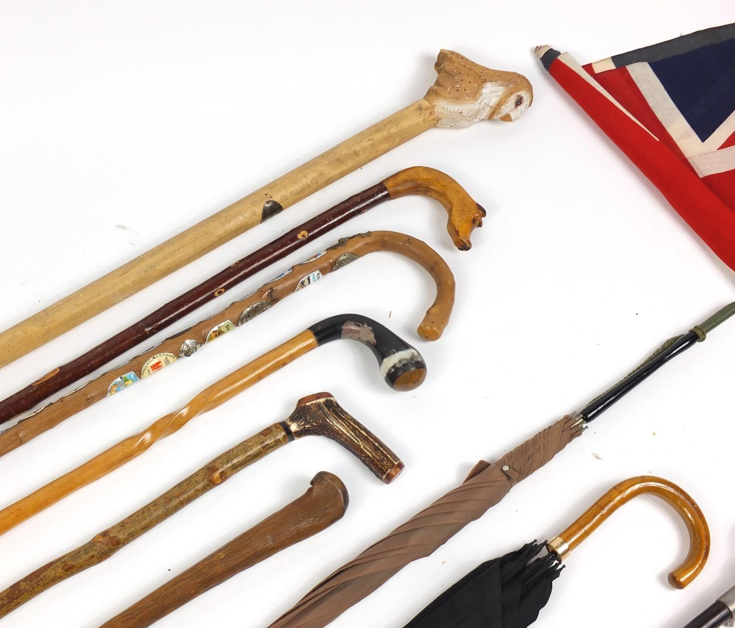 Vintage and later walking sticks, parasols and a Union Jack flag, some with silver handles : For - Image 2 of 6