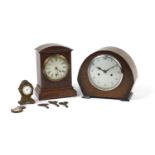 Two oak cased mantel clocks and a pocket watch in a gilt metal stand : For Further Condition Reports