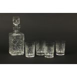 Cut glass decanter and stopper with a set of four tumblers, the decanter 29cm high : For Further