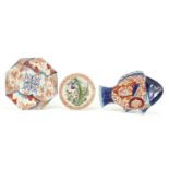 Two Japanese Imari dishes and one other, one in the form of a fish, the largest 25cm in length : For