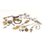 Objects including a miniature silver hand mirror, silver rings and silver brooches : For Further