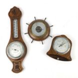 Three oak wall hanging barometers, the largest 46cm in length : For Further Condition Reports Please