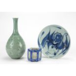 Chinese porcelain including a celadon vase and blue and white plate decorated with dragon, the