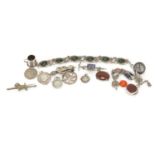 Silver and white metal jewellery including bracelet set with cabochon green hard stones, charms