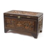 Chinese camphorwood chest carved with dragons, fish and a temple, 60cm H x 100cm W x 53cm D : For