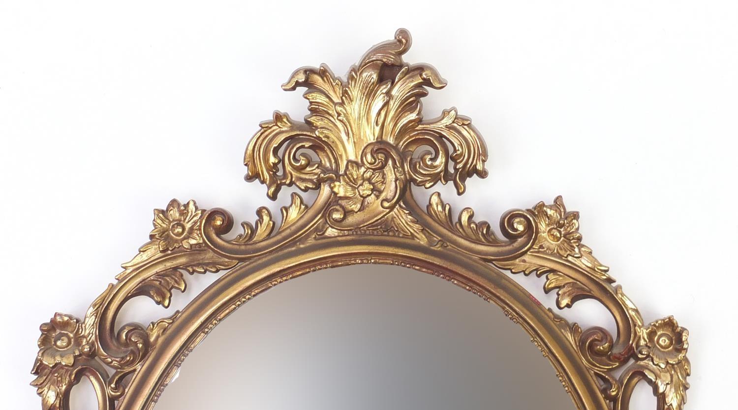 Oval gilt framed wall hanging mirror, 83cm x 51cm : For Further Condition Reports Please visit our - Image 2 of 4