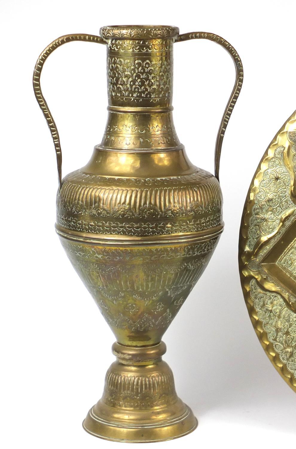 Large Indian brass twin handled vase and circular tray, both embossed and engraved with foliate - Image 2 of 5
