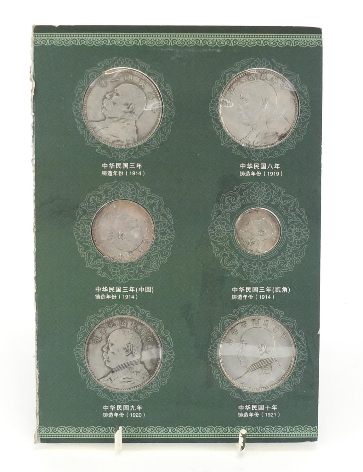 Six Chinese silver coloured metal fatman design coins : For Further Condition Reports Please visit