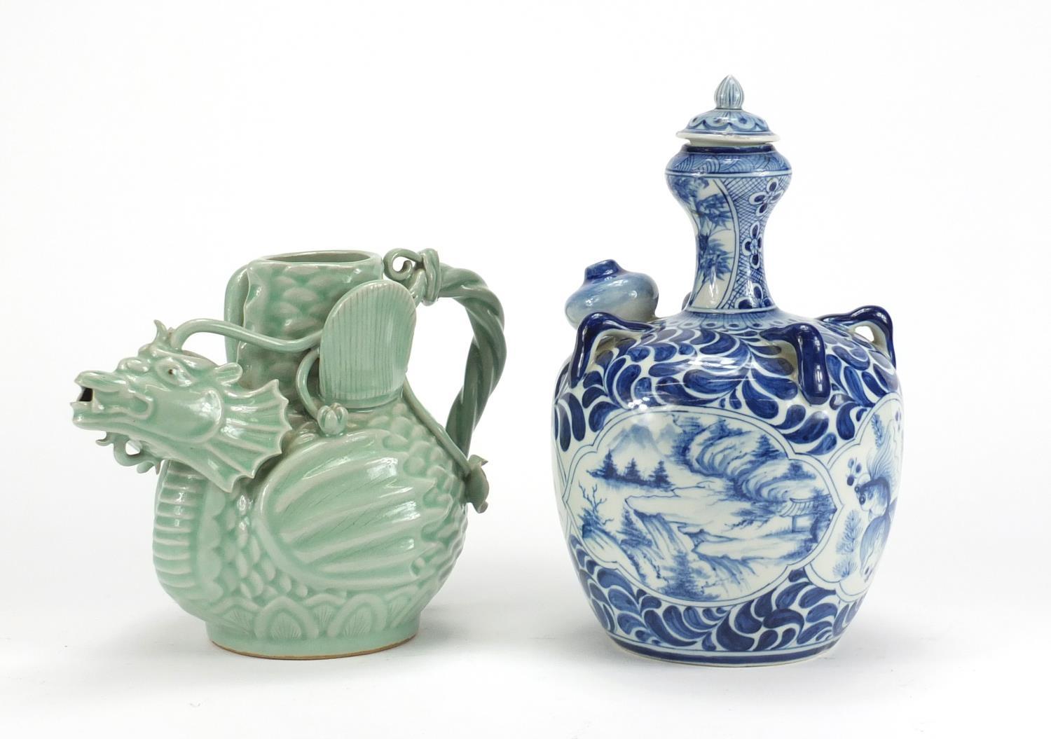 Chinese celadon glazed teapot and a blue and white porcelain bottle vase with cover, the largest