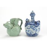 Chinese celadon glazed teapot and a blue and white porcelain bottle vase with cover, the largest