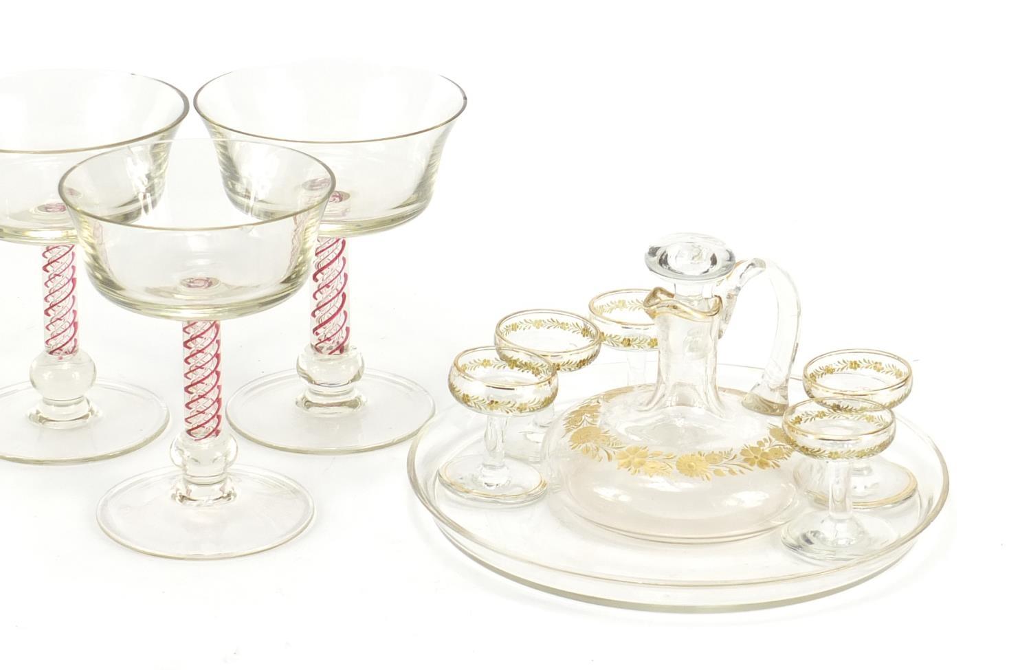 Glassware including a cabaret service, gilded with flowers and six glasses with air twist stems, the - Image 3 of 3