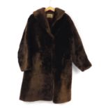 Brown fur coat with Frances Furriers Epsom label, 105cm in length : For Further Condition Reports